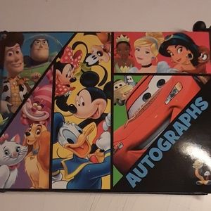 Walt Disney autograph book with pen